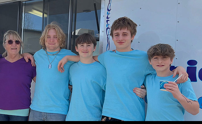 Teresa with her Grandsons 2023 